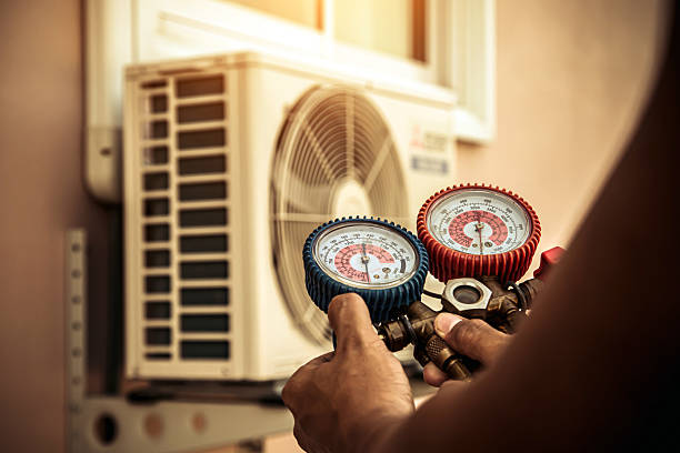 Professional Air Conditioning Service technician working in Ocean City, MD